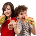 Young People Eating Hamburgers